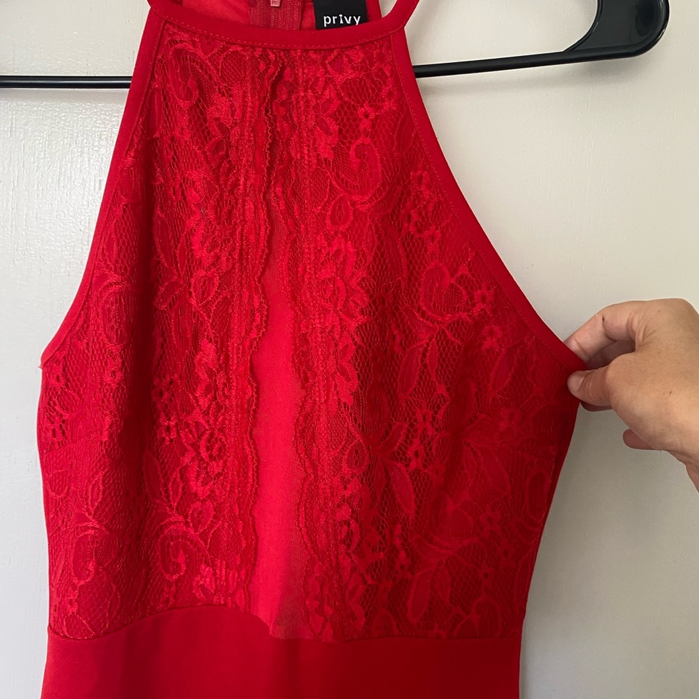 Privy red lace cocktail dress. Calf length. Mesh over cleavage. Choker.